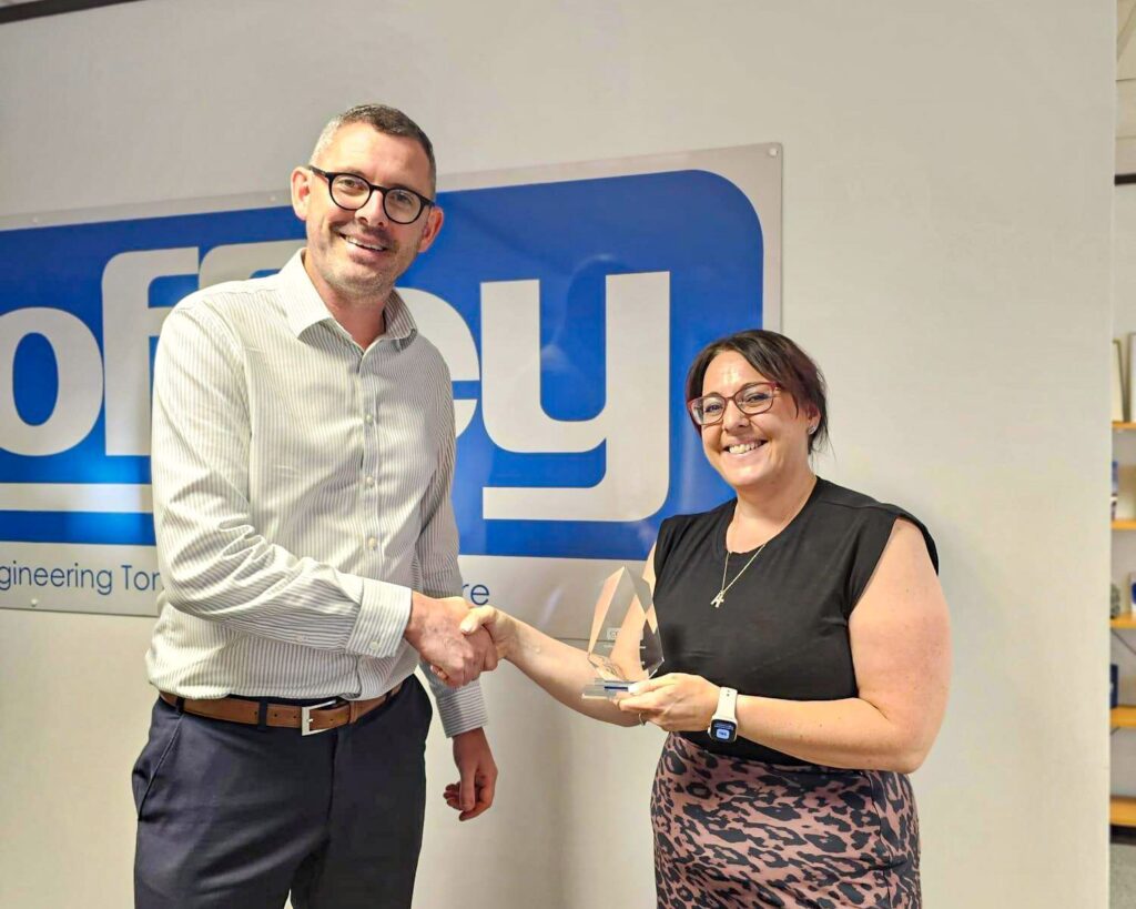 Kate Thompson, Managing Quantity Surveyor at Coffey receiving the 'Do It Better' award